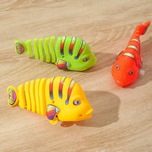 Load image into Gallery viewer, Clockwork Swinging Cartoon Fish  Toys